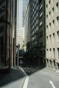 A vibrant street view of Sydney's downtown featuring modern skyscrapers and urban architecture.