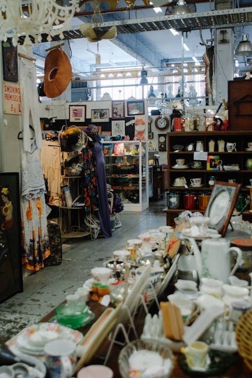 View of Shelves with Tableware in a Thrift Store 