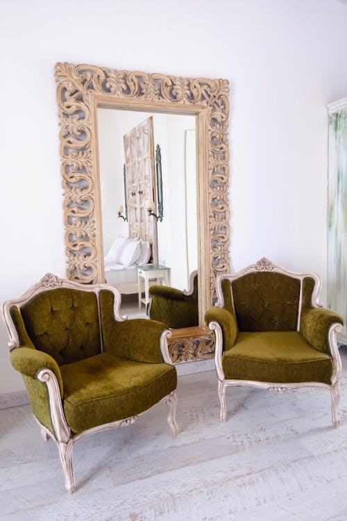 Armchairs near Mirror