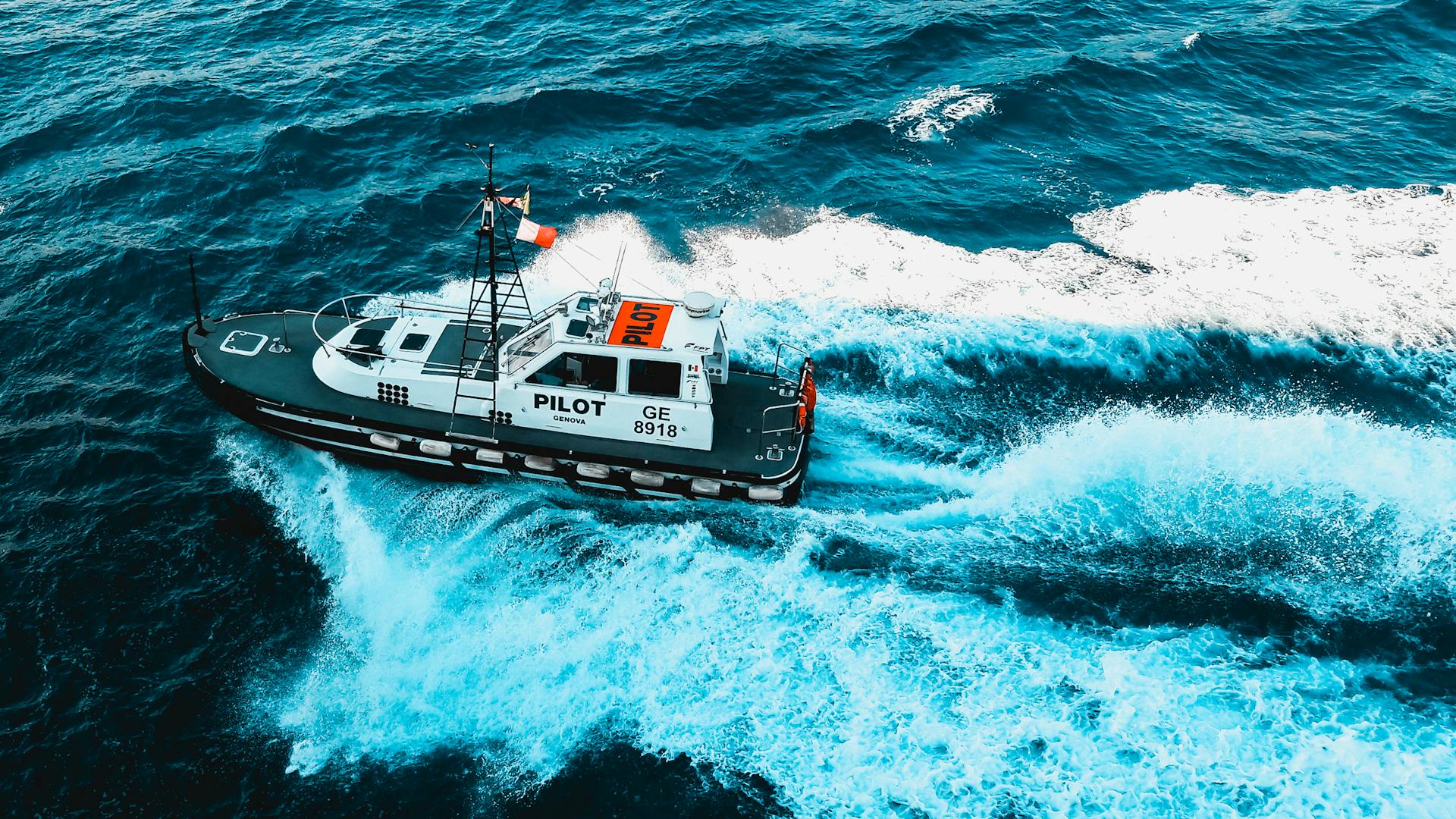 Black and White Pilot Tug Boat on Ocean