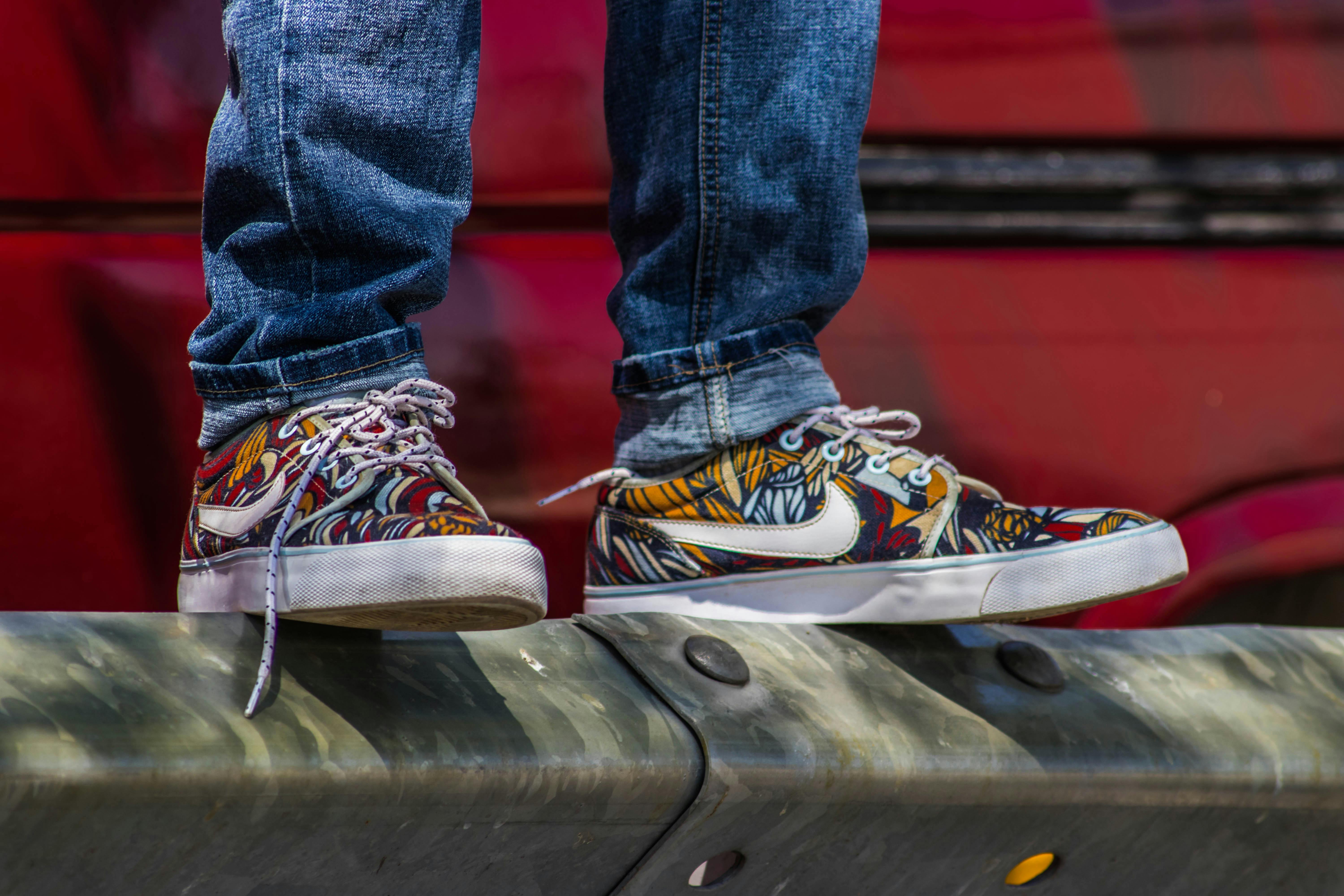 red and black nikes with yellow laces