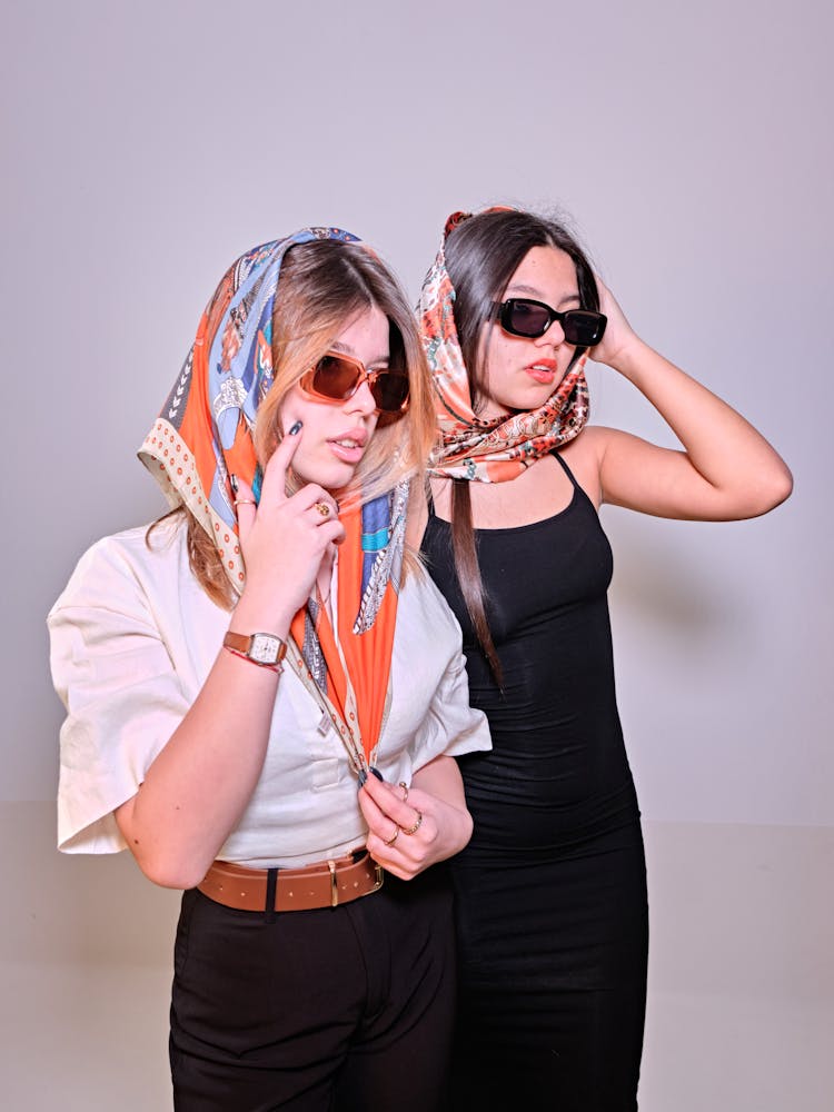 Women Wearing Sunglasses And Retro Headscarfs