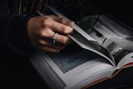 Snake Ring on Hand with Book