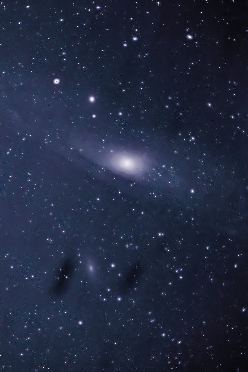 Captivating night sky featuring the Andromeda Galaxy and countless stars sparkling in space.