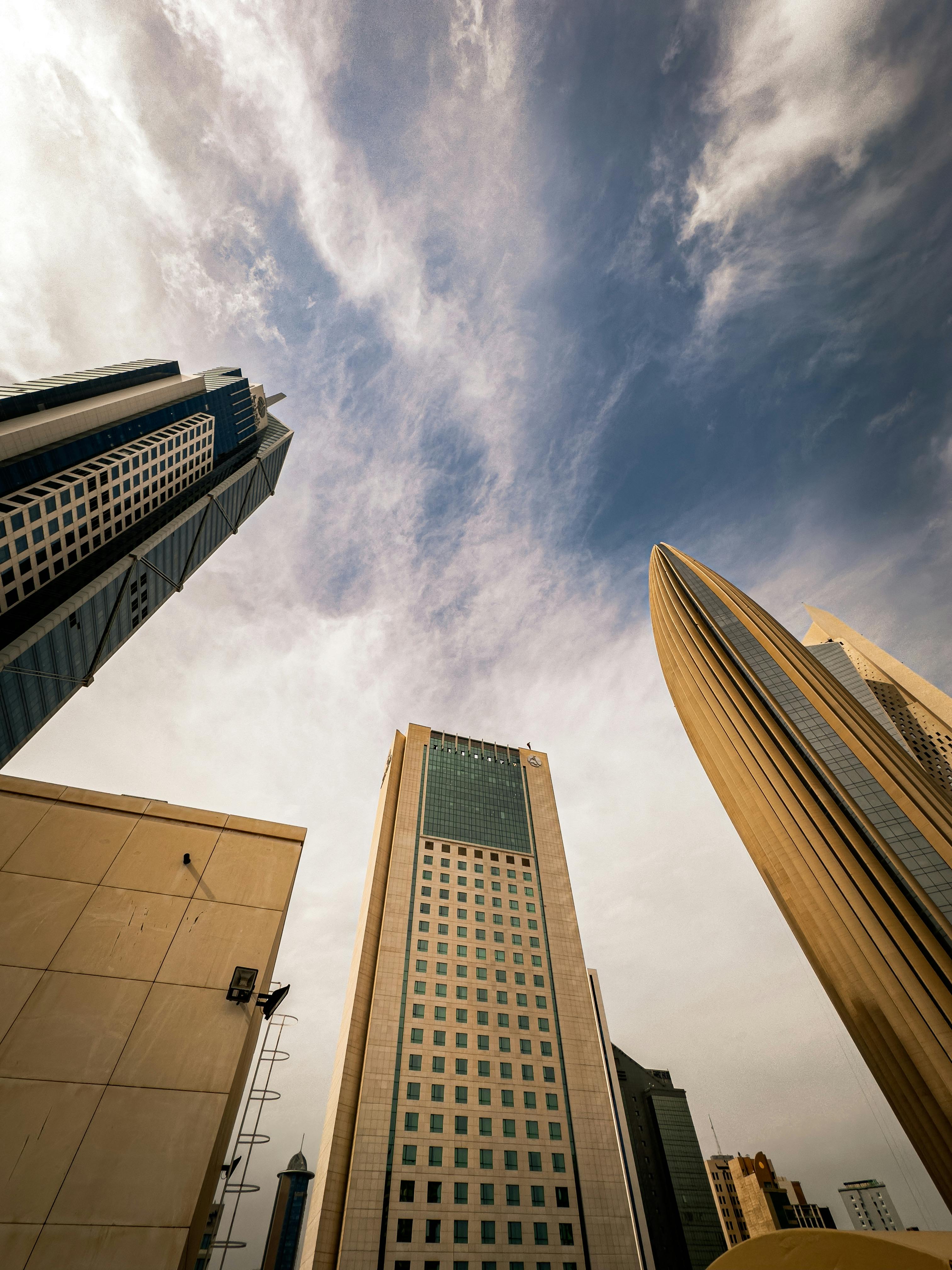 a view of tall buildings in a city