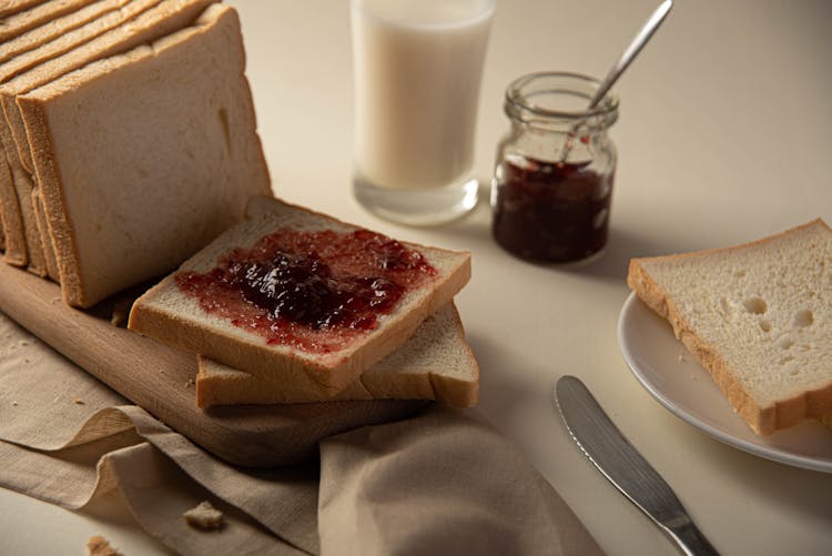 Toast Bread With Jam On Table