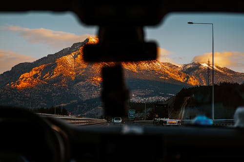 View of a Mountain from a Car 