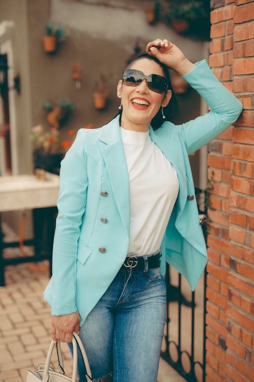 Woman in Blue Jacket and Jeans 