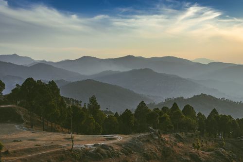 Free Peaceful dawn view of foggy mountains and forest landscapes in India. Stock Photo
