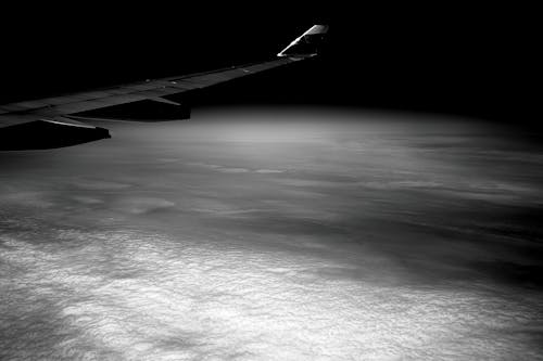 Airplane Wing in Gray Scale Photohraphy