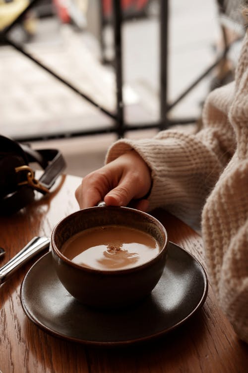 Woman Hand Holding Coffee Cup