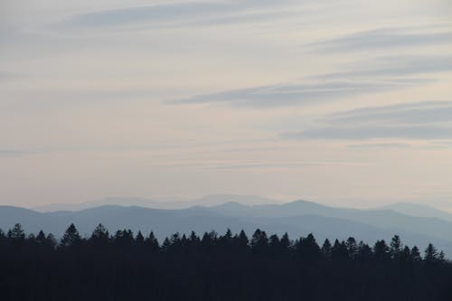 Silhouettes of Mountains at Dawn