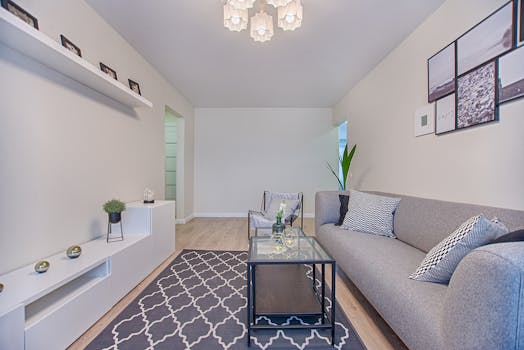 Stylish living room with modern furniture, elegant rug, and cozy atmosphere in Vilnius.