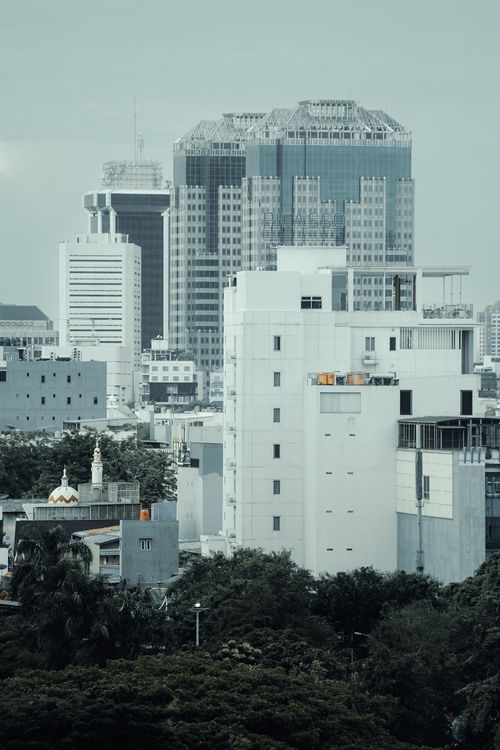 Free A view of modern skyscrapers in Jakarta, showcasing urban architecture and cityscape. Stock Photo