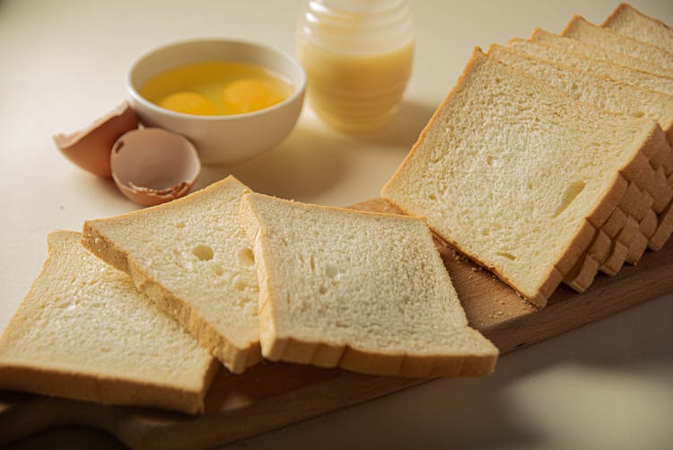 Fresh Bread And Eggs On Table