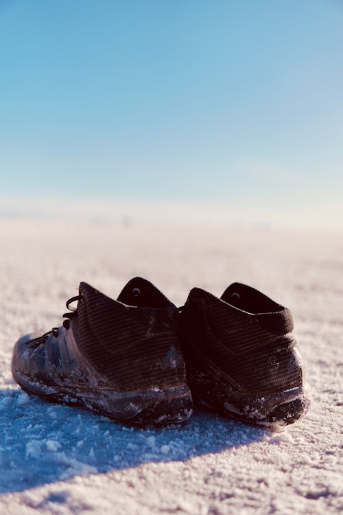Close-up of Shoes on the Beach 