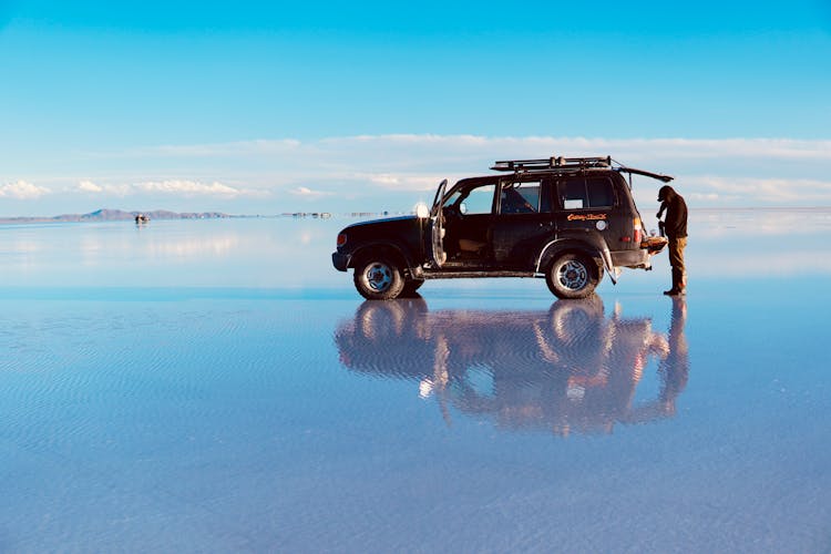 Truck Parked On A Frozen Lake