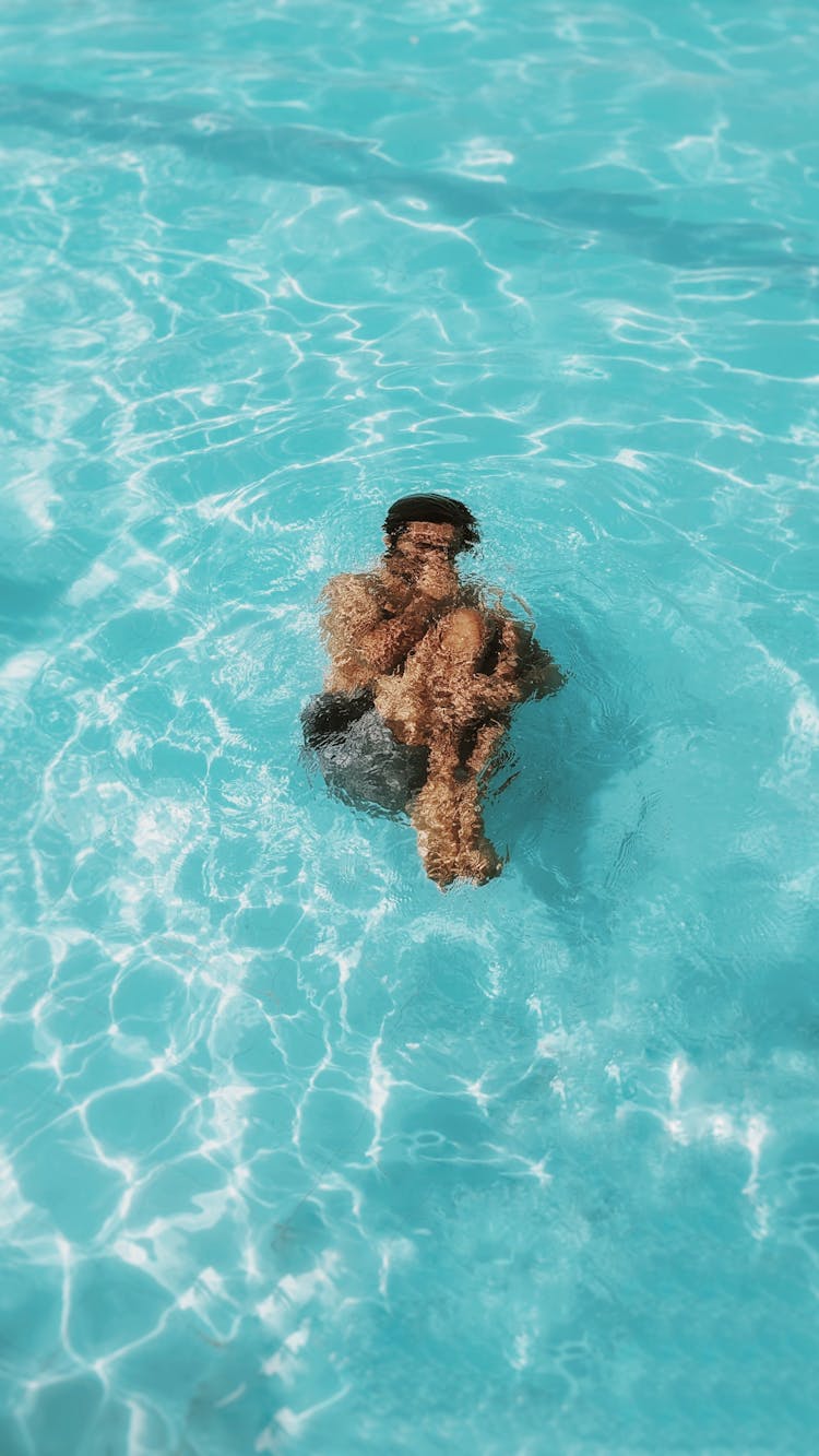 Man Diving In The Pool