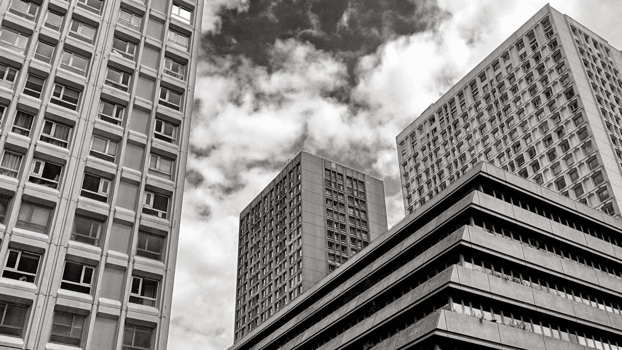 Free Greyscale Photography of High Rise Building Stock Photo