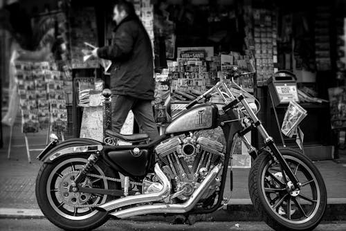Grayscale Photo of a Cruiser Motorcycle