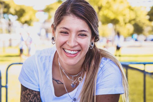 Woman Smiling While Taking Selfie