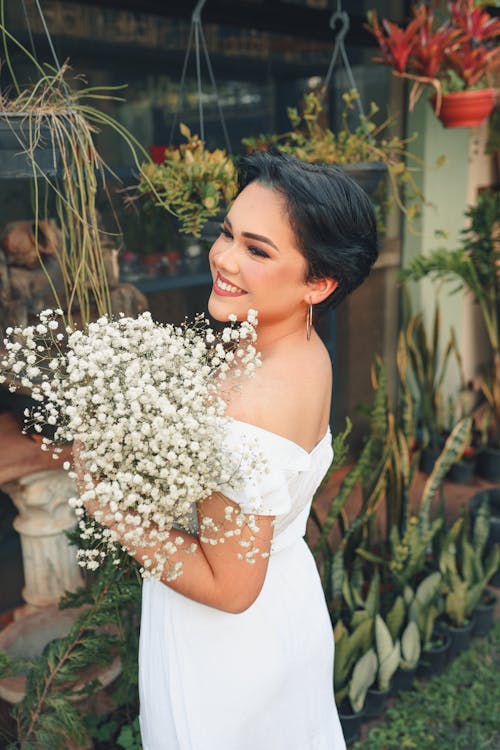 Smiling Woman Posing with Bouquet