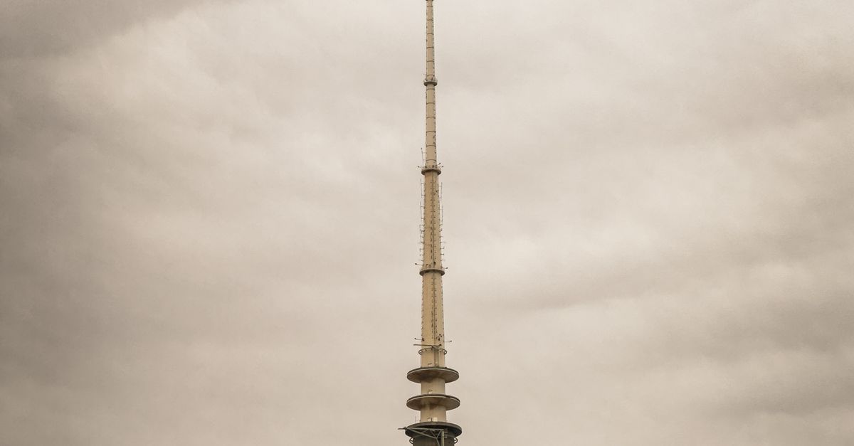 Capture of Kuwait City featuring the iconic Liberation Tower against a cloudy sky.