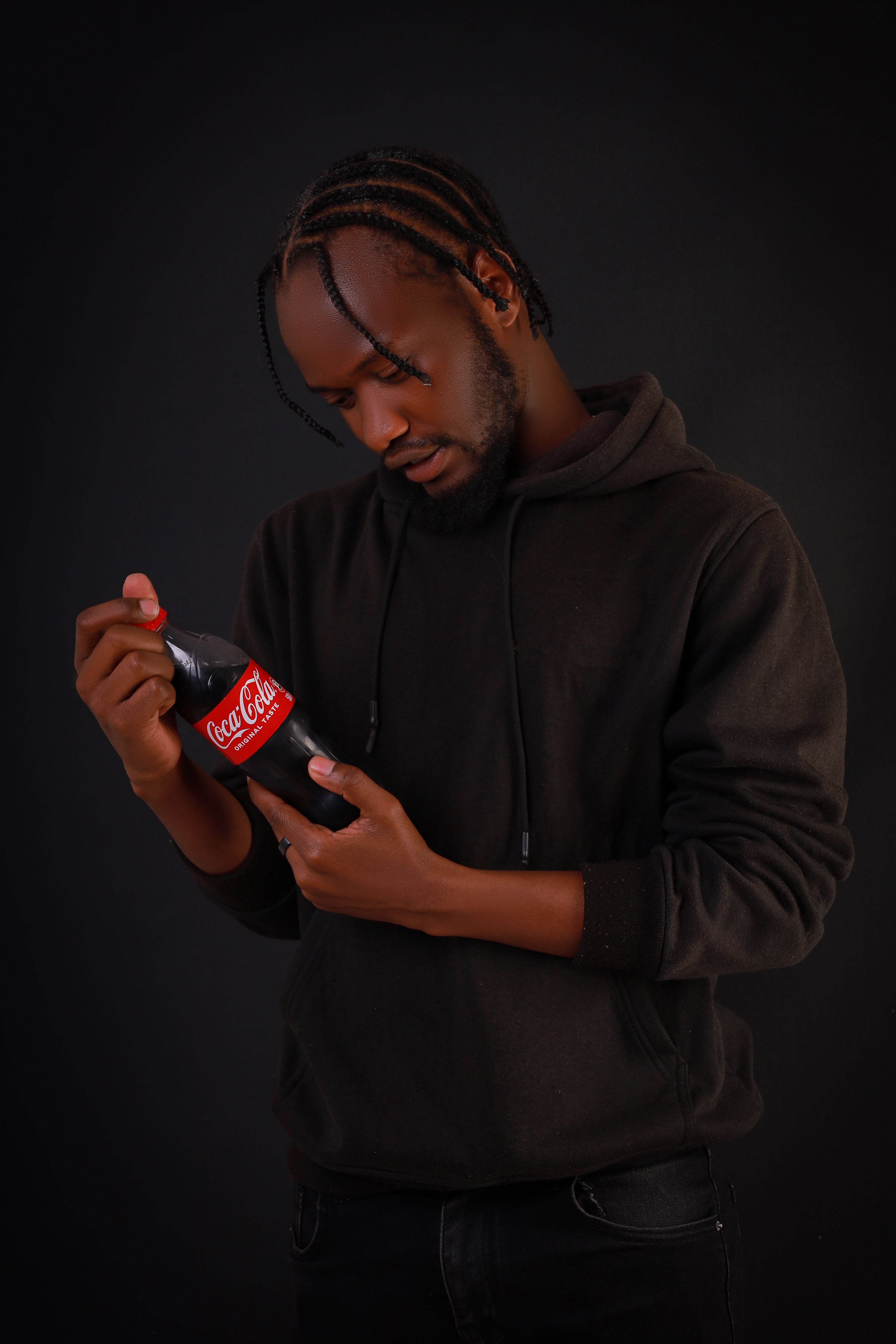 Man Reading the Coca-Cola Label · Free Stock Photo