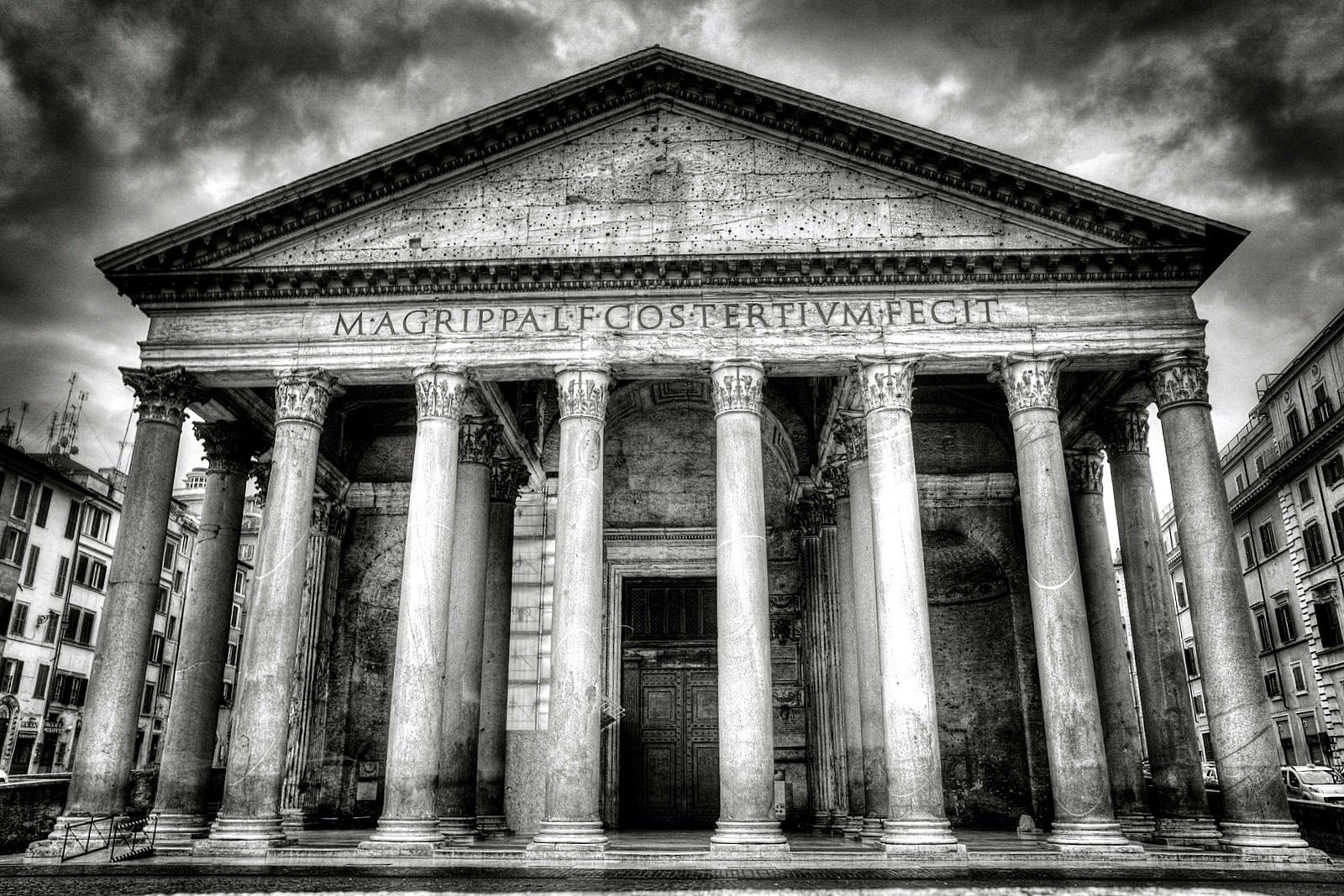 Building With 8 Concrete Pillar in Front Grayscale Photo · Free Stock Photo