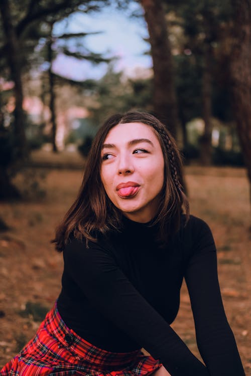 Woman Showing a Tongue