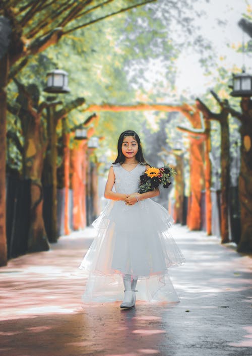 Cute Little Girl in White Dress