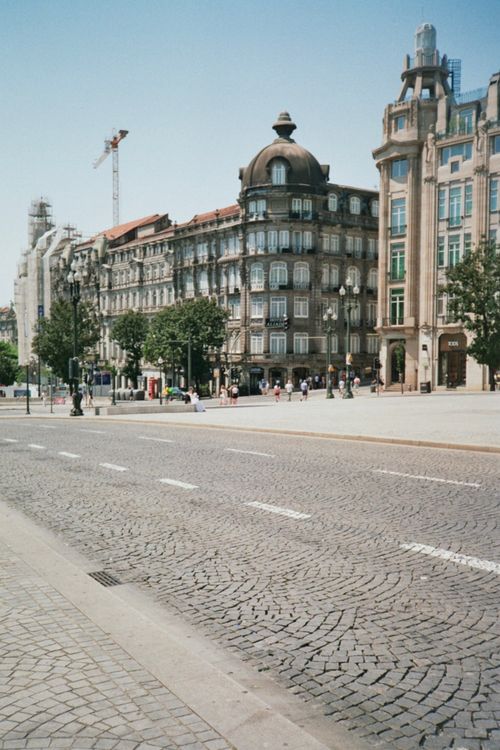 Free Capturing a historic urban street view in Porto with classic architecture under daylight. Stock Photo
