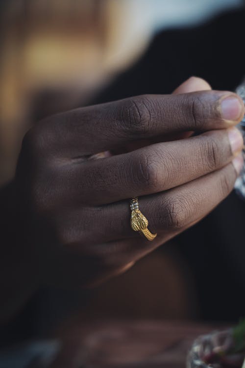 Golden Snake Ring on Hand