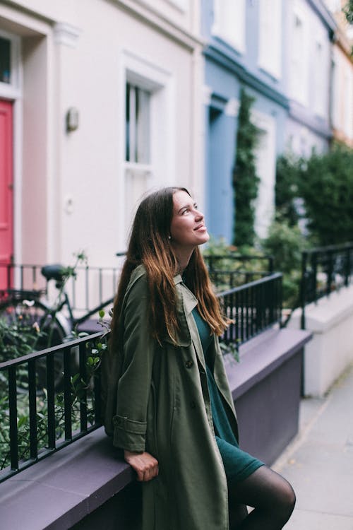 Free Woman Sitting on Sitting on Bench Stock Photo