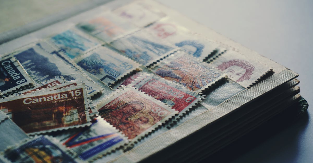 Free stock photo of book, stamp collection, stamps