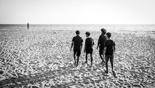 Men on Beach in Black and White