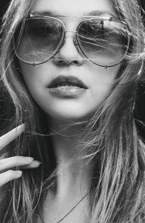Portrait of a Woman Wearing Sunglasses