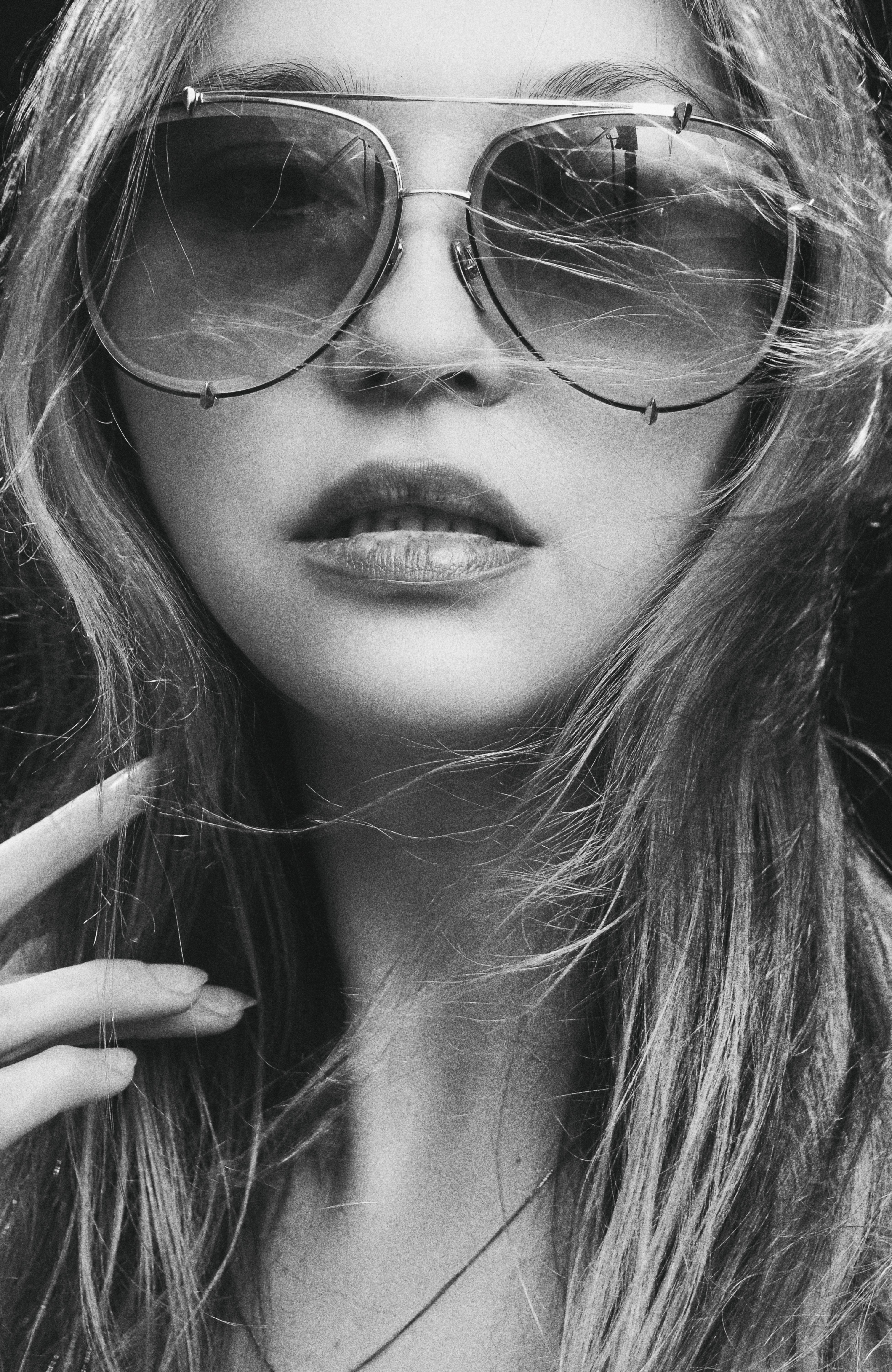Portrait of a Woman Wearing Sunglasses · Free Stock Photo