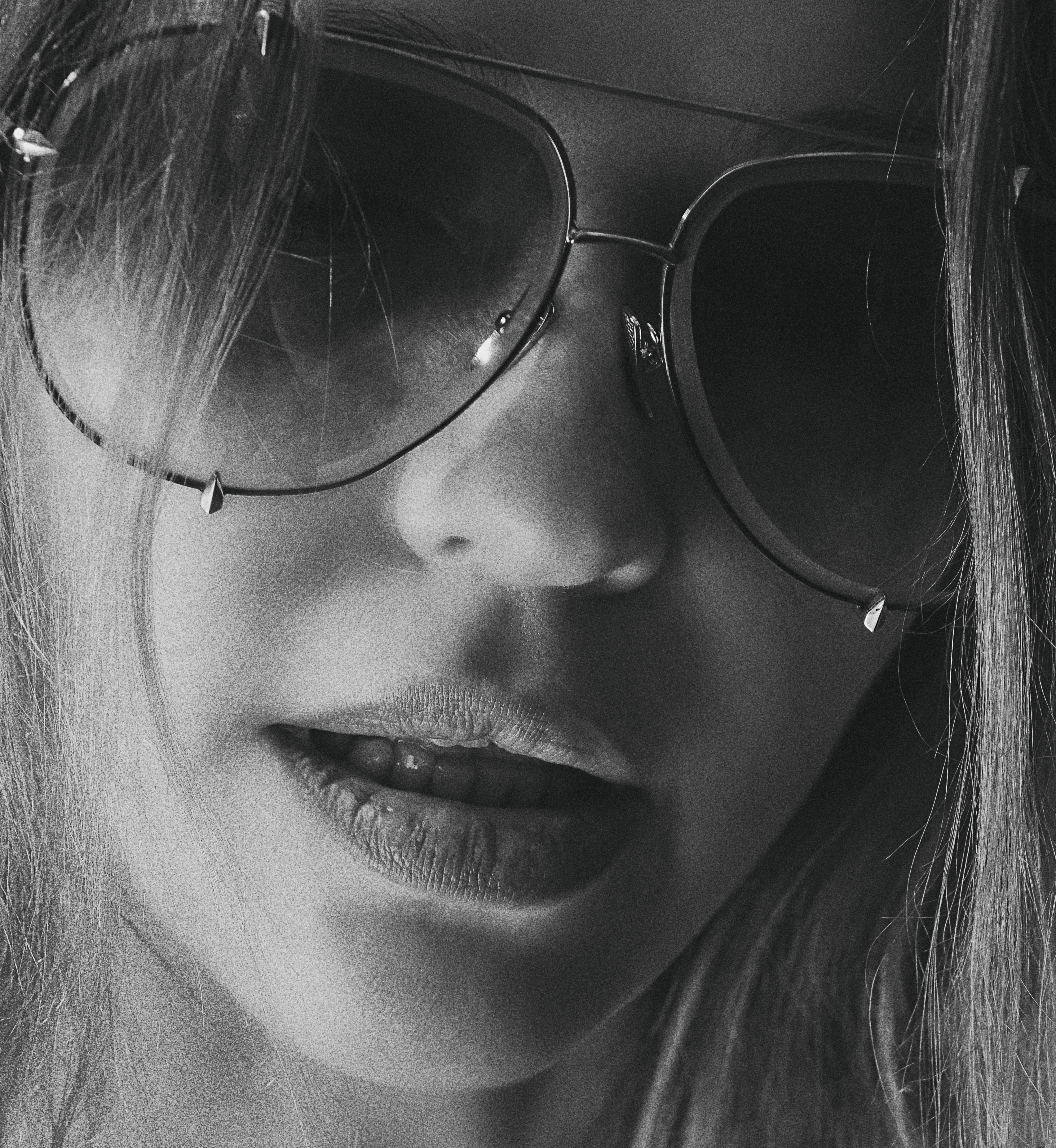 Portrait of a Woman in Sunglasses · Free Stock Photo