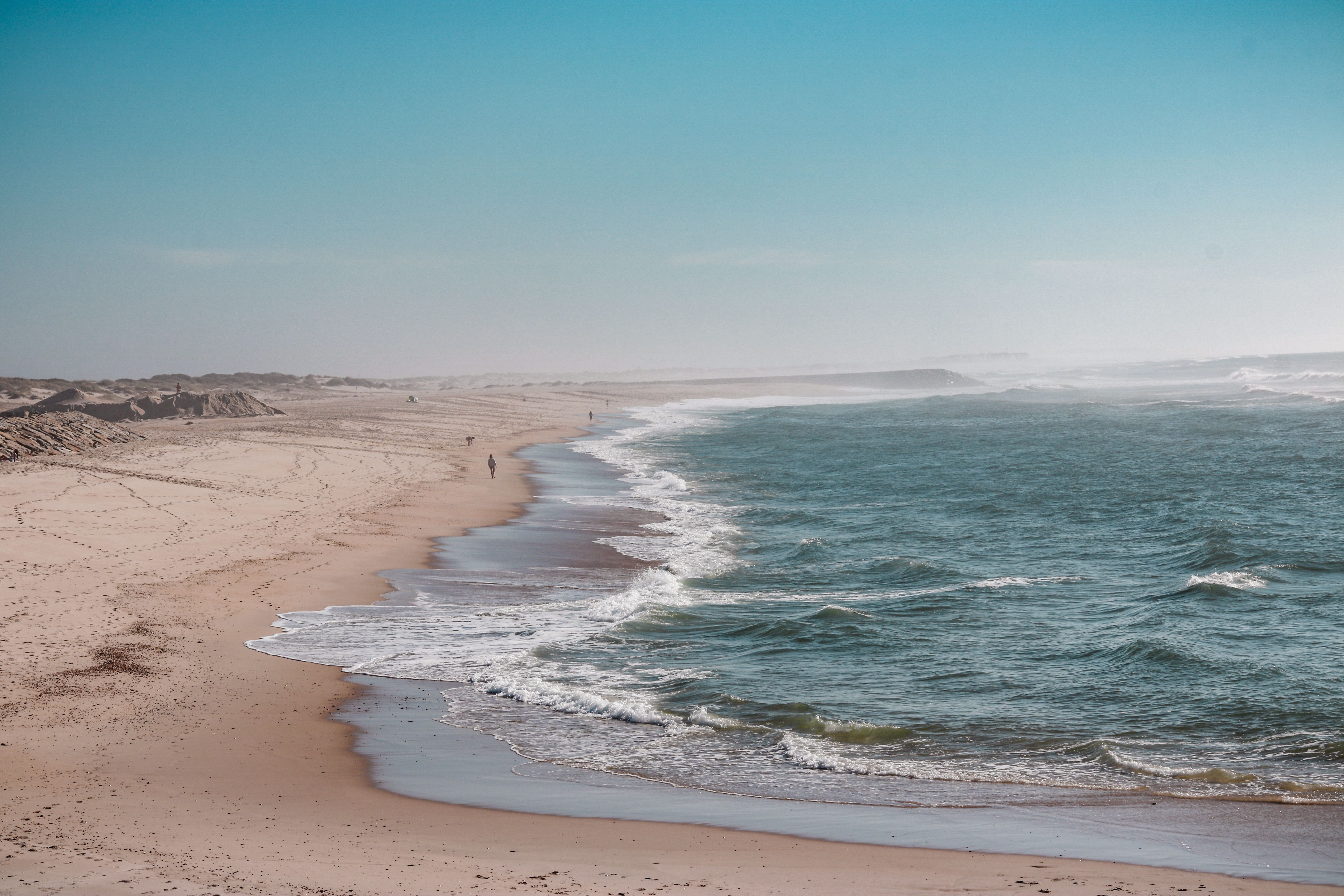 Empty Atlantic beach on Portugal's Alentejo coast near Comporta at sunset