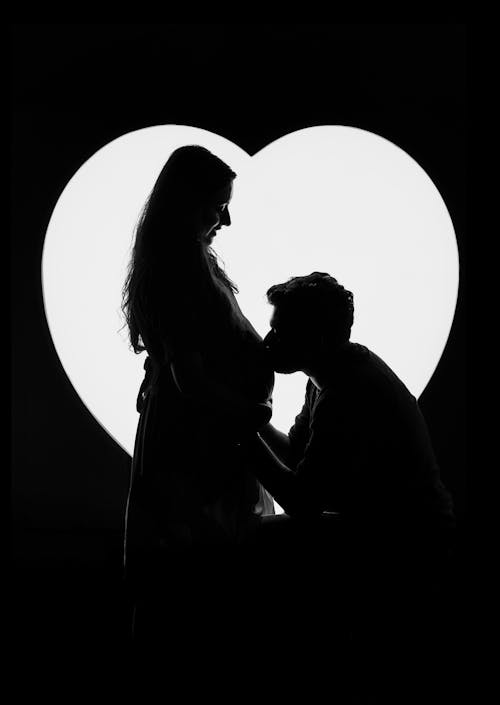 Maternity photoshoot couple love silhouette