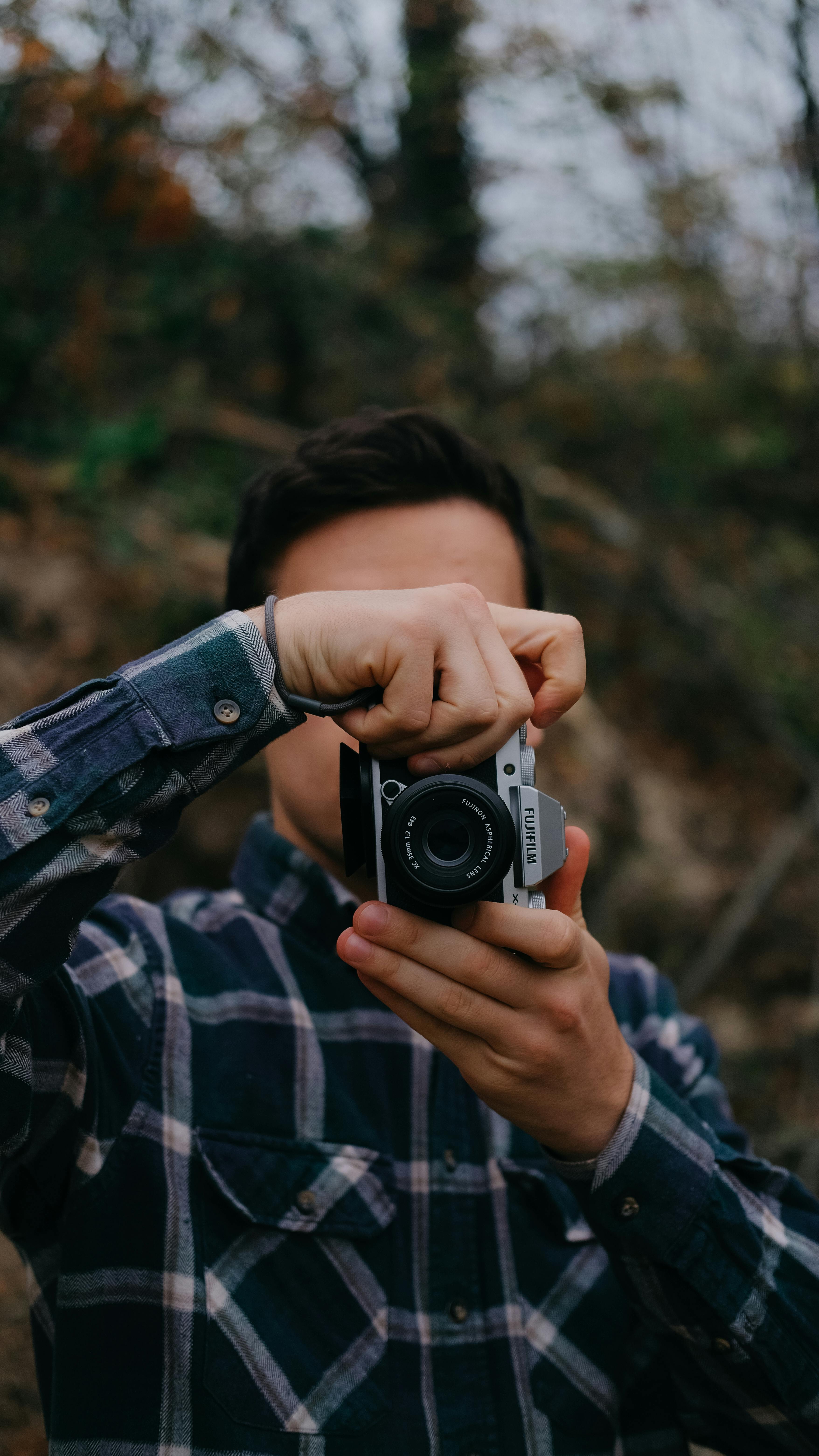 Man with Fishing Rod and Fishing Clothes · Free Stock Photo