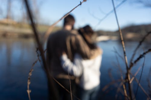 Couple standing by the falls