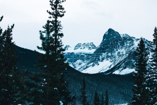 Breathtaking view of snow-covered mountains in Banff National Park, Canada.