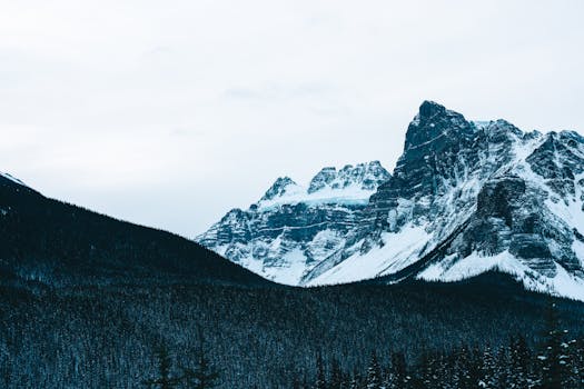 Stunning winter view of snow-covered mountains in Banff National Park, Canada.