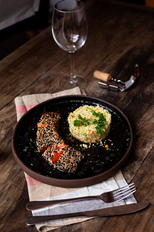 Roasted Fish with Rice on a Plate