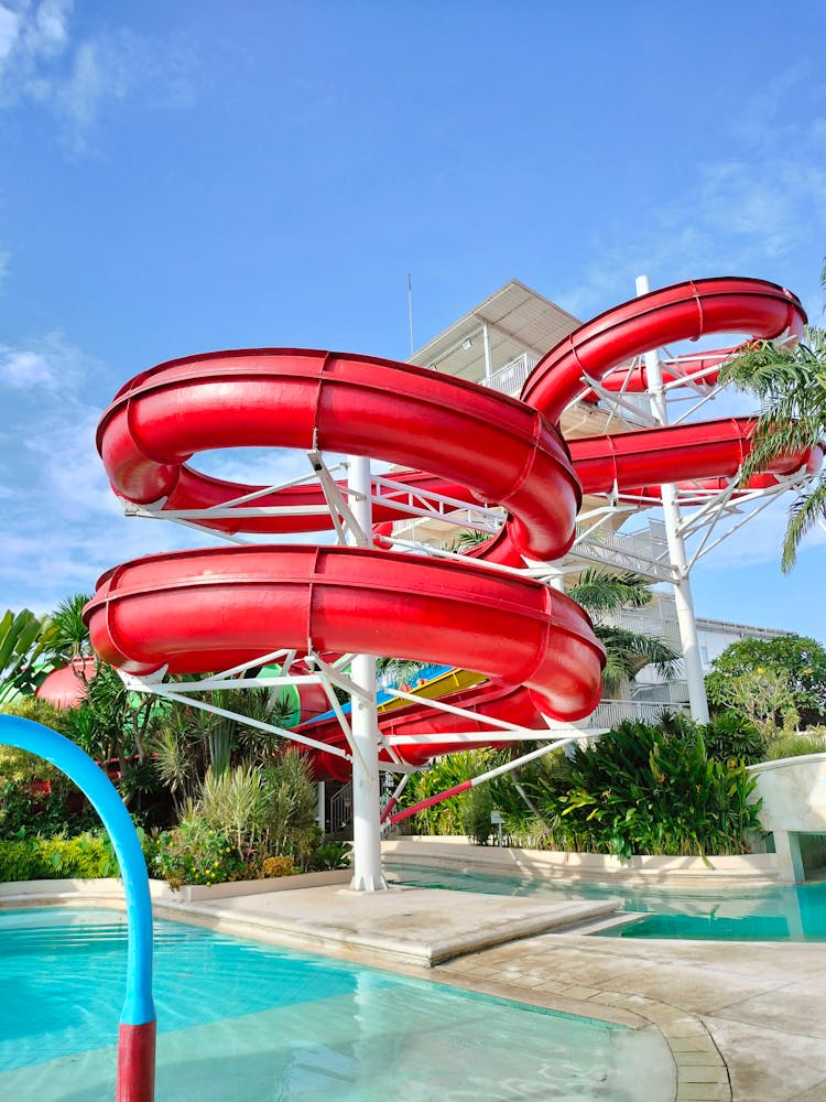 Red Slide At The Swimming Pool