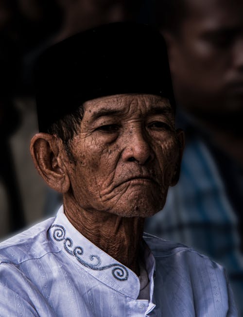 Portrait of an Elderly Man in Traditional Clothing 