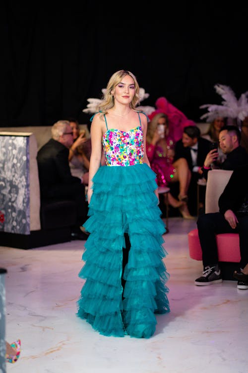 Young Model in a Blue Dress on a Fashion Show 