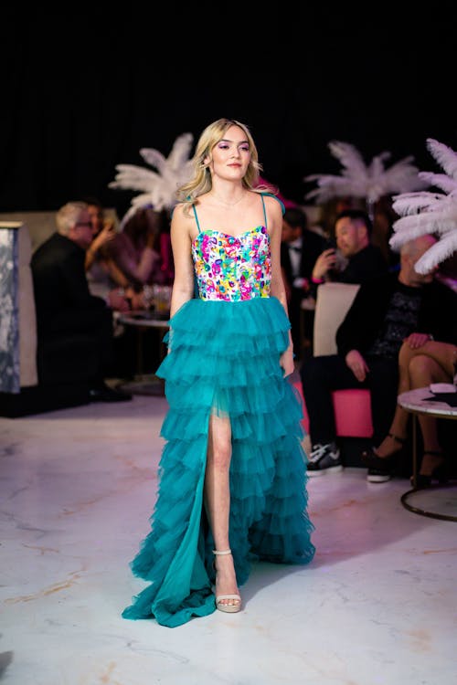 Young Model in a Blue Dress on a Fashion Show 